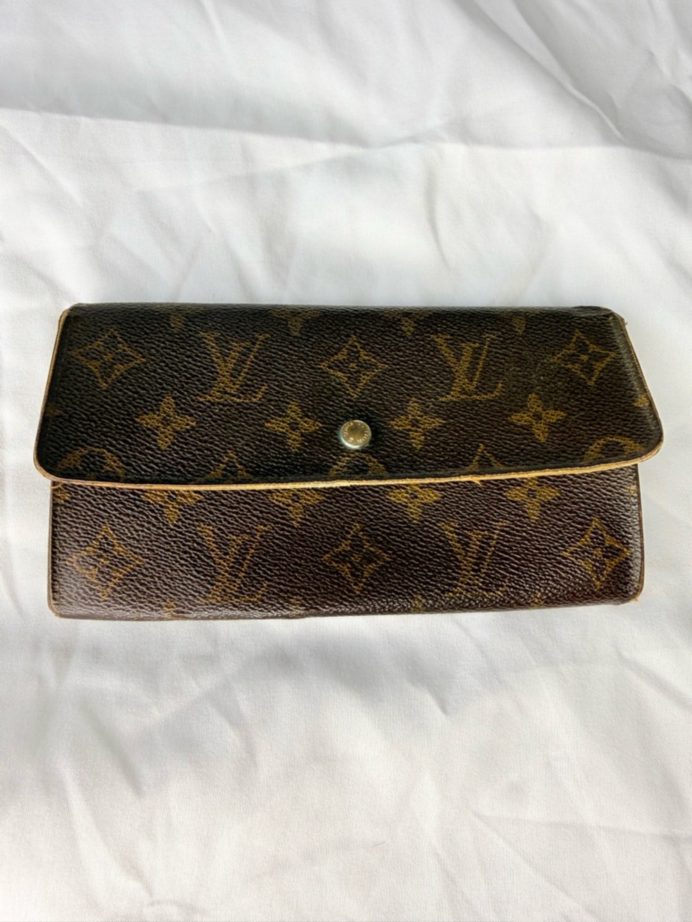 Authentic Louis Vuitton Brown Monogram Sarah Wallet
Classic Design